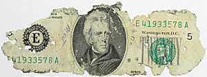 Original twenty dollar bill from the money find on Tena Bar. Initials in pen represent the FBI agent who confirmed the serial number match to the Cooper bill list.