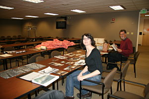 Carol Abraczinskas, University of Chicago and Tom Kaye, Burke Museum examine the D.B. Cooper archive at the Seattle FBI in 2009.